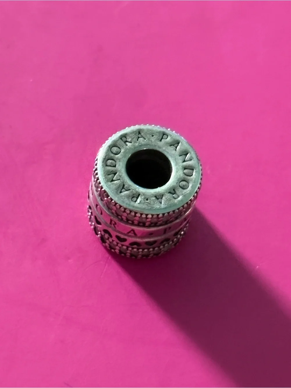 Pandora Sterling Silver Stacked Heart Spacer Charm - Pink Background